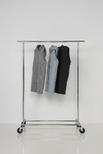 Load image into Gallery viewer, Caju Puffer Vest Geometric Panels with Removable Hood Grey colour in a rack