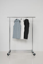 Load image into Gallery viewer, Caju Puffer Vest Geometric Panels with Removable Hood White colour in a rack
