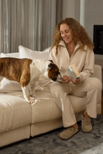 Load image into Gallery viewer, Goondiwindi Cotton - Rugged ½ Zip Cotton Sweater - Birch colour, model sitting in a couch
