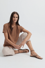 Load image into Gallery viewer, Yarra Trail - Solitude Tee - Clay colour sitting shot
